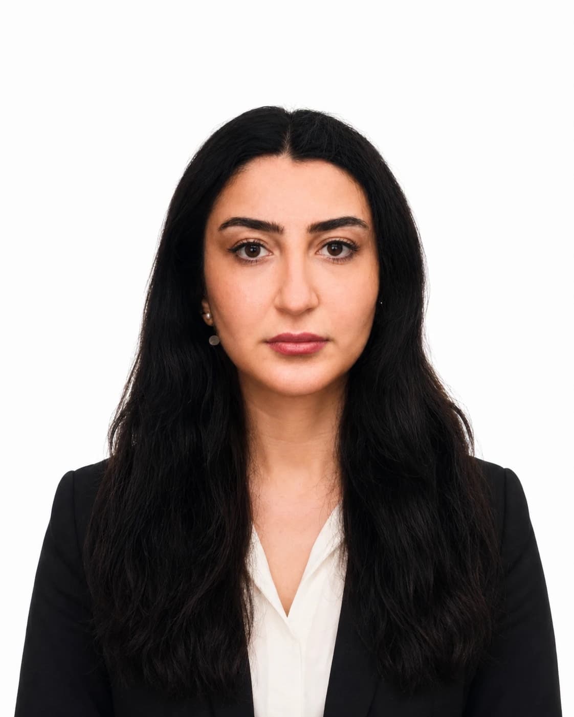 Portrait of Sara in a black blazer and white blouse